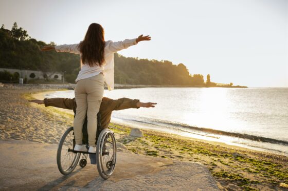 disabled man and a woman on vacation