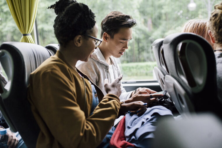 Young travellers on a bus trip