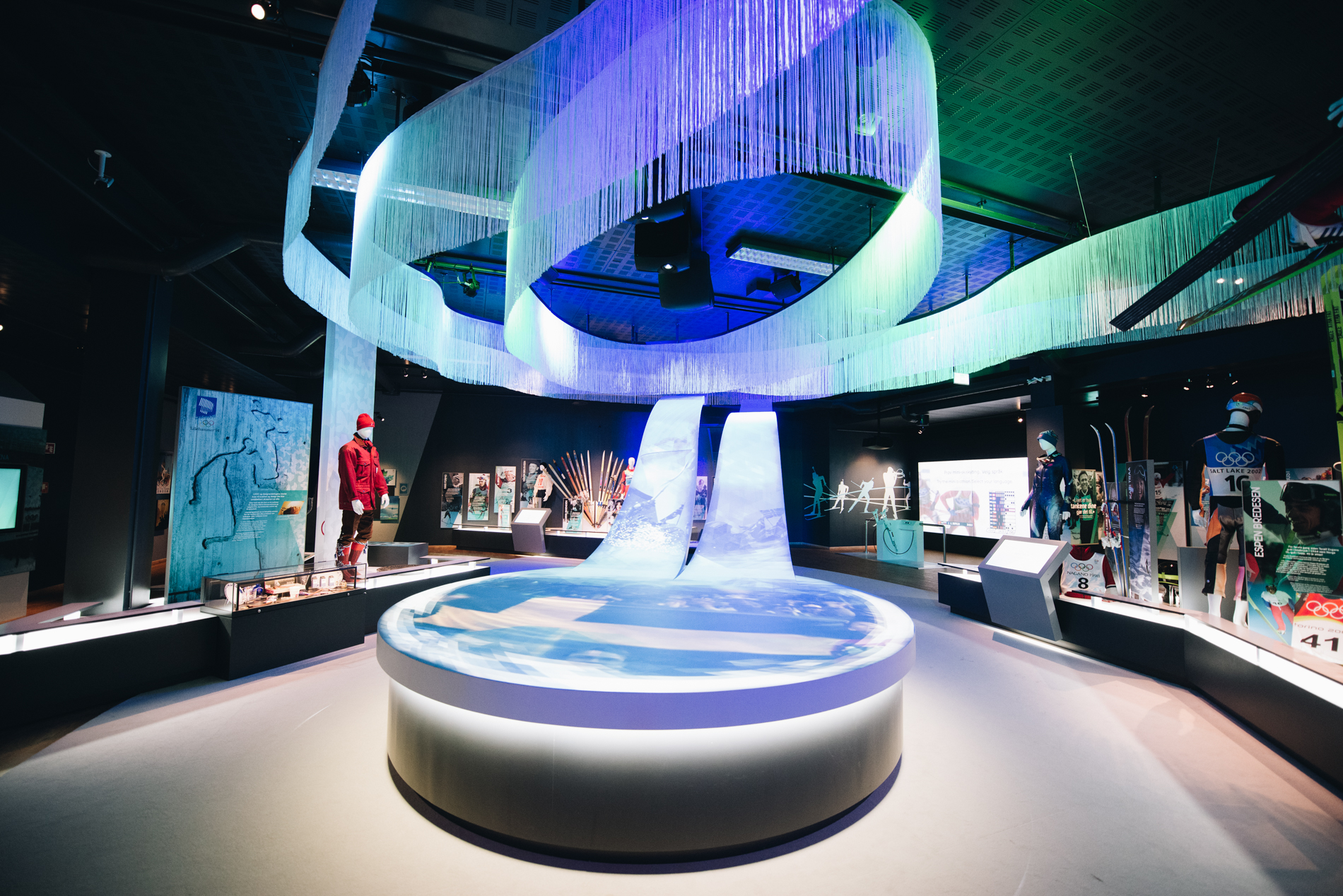 Die Olympischen Winterspiele 2022 bei ehemaligen Olympia-Gastgebern